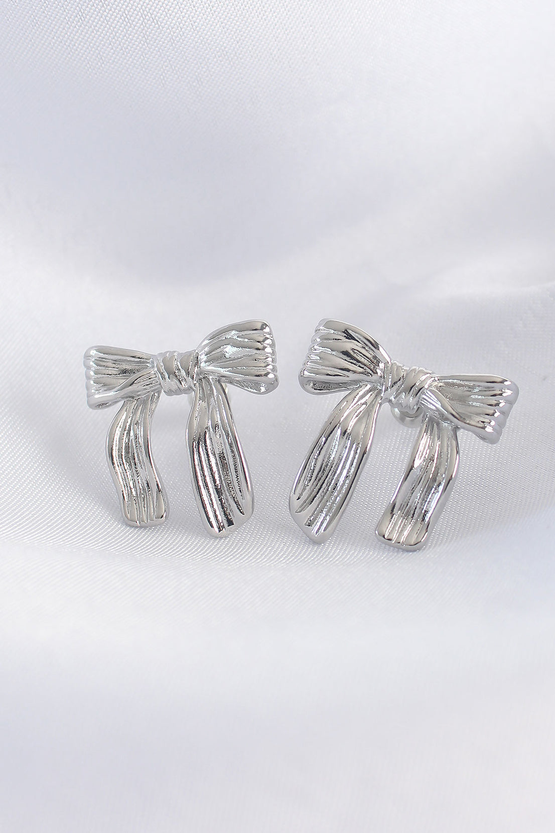 Brass Silver Color Line Detail Bow Earring